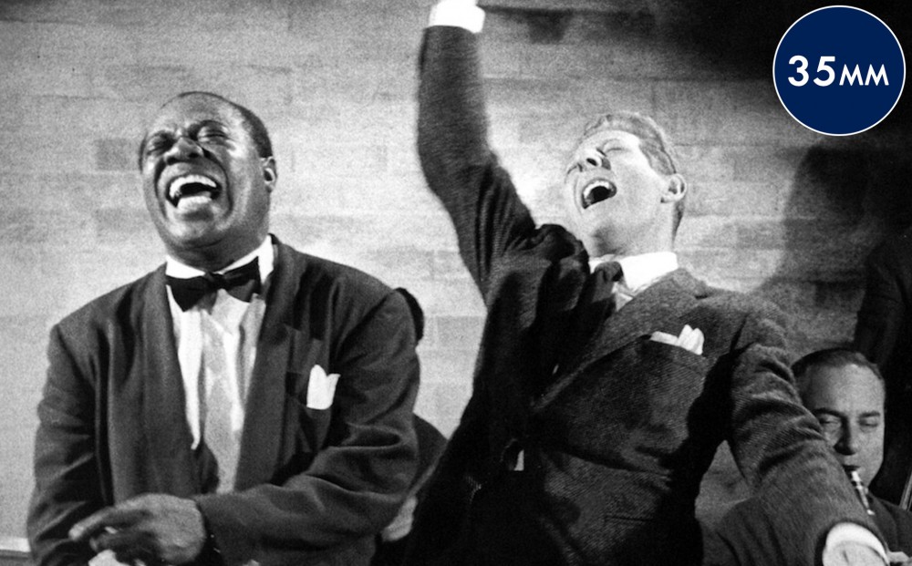 Louis Armstrong and another musician perform.