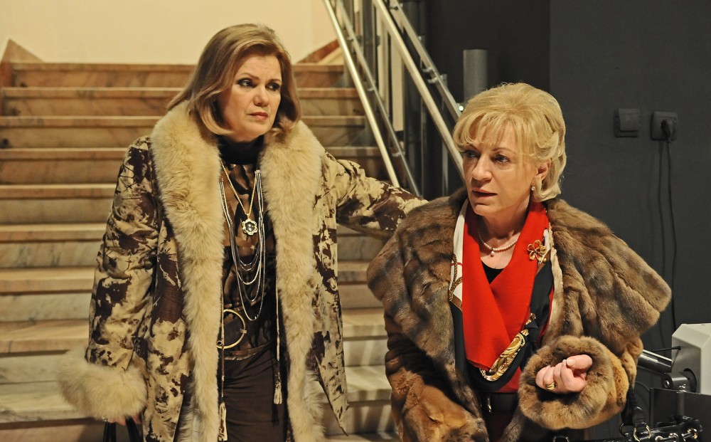 Two women in fur coats.