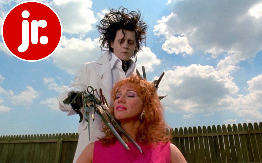 Actor Johnny Depp gives Kathy Baker a haircut with his scissorhands, in her backyard.