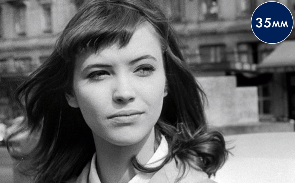 Actor Anna Karina, her blown slightly by the wind.