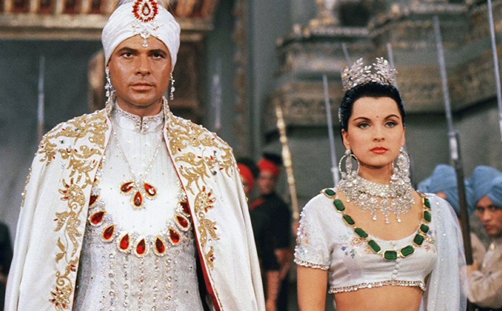 From THE INDIAN TOMB: Actor Walter Reyer as the maharajah and Debra Paget wear ornate, traditional Indian clothing.