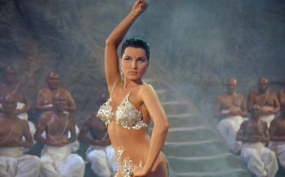 From THE INDIAN TOMB: Actor Debra Paget performs her snake dance in a barely-there, sequined costume.