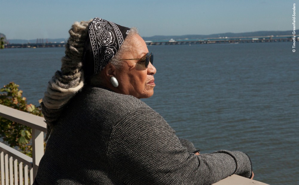 Toni Morrison looks out over a harbor.